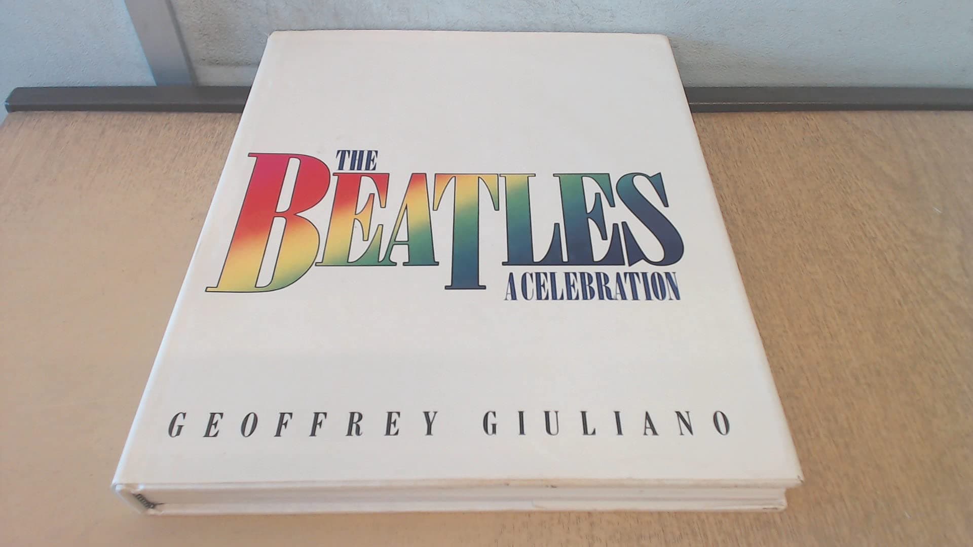 The Beatles: A Celebration by Geoffrey GIULIANO