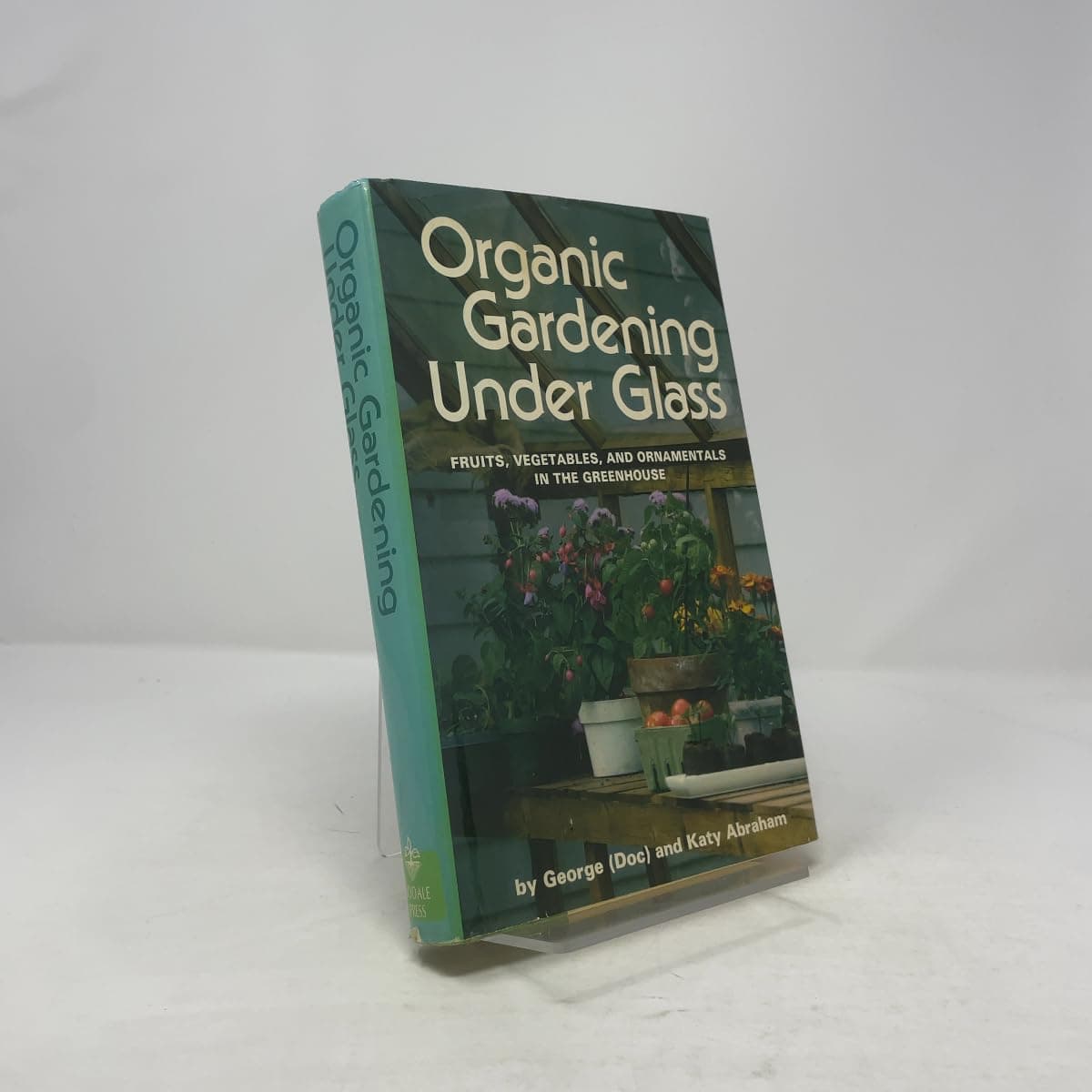 Organic gardening under glass: Fruits, vegetables, and ornamentals in the greenhouse by George Abraham