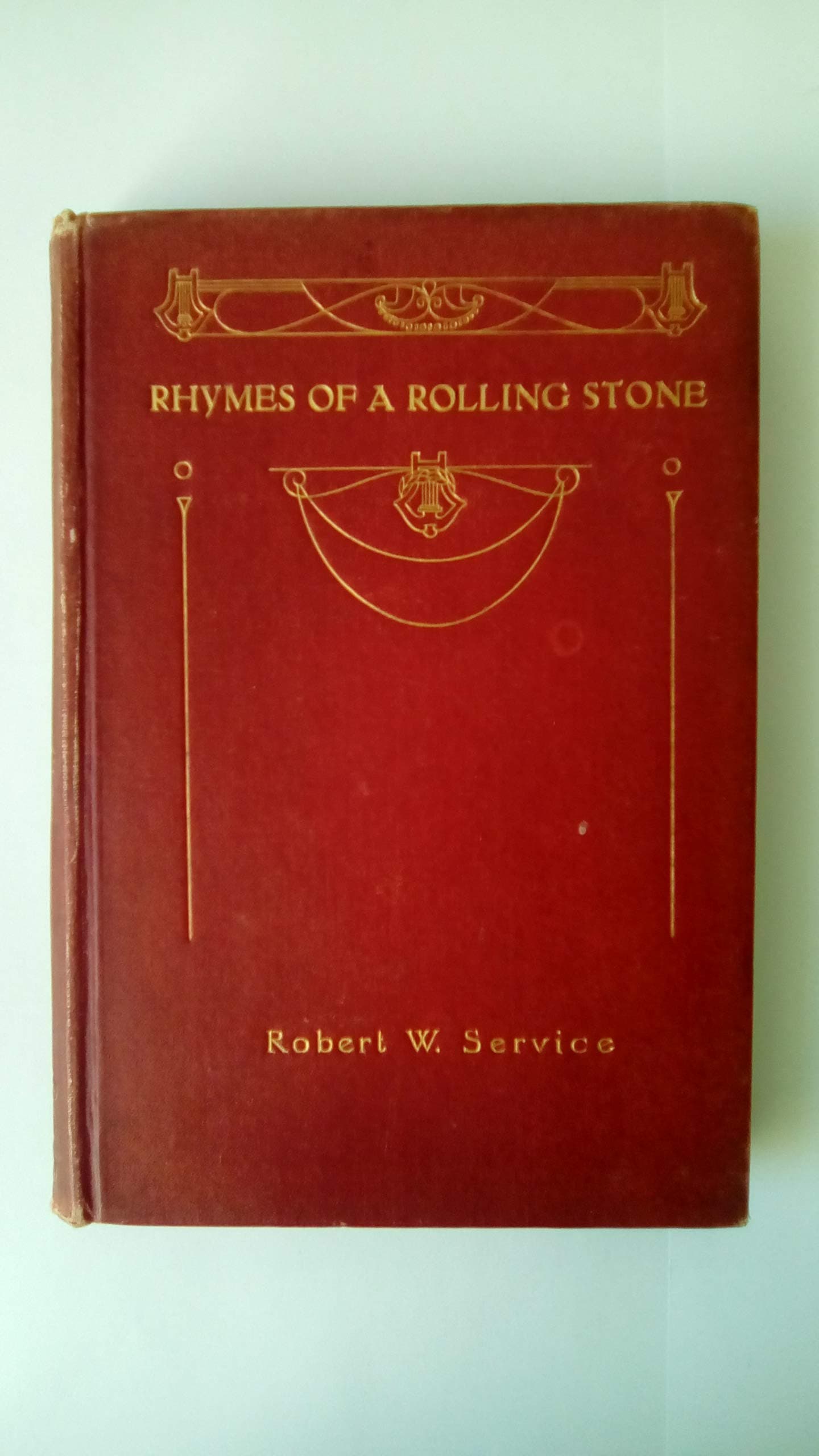 Rhymes of a rolling stone [Hardcover] Service, Robert W. by null