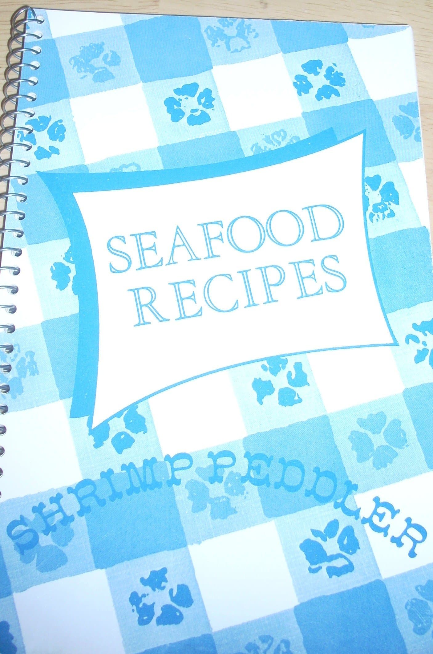 Seafood Recipes From the Shrimp Peddler [Spiral-bound] unknown author by null