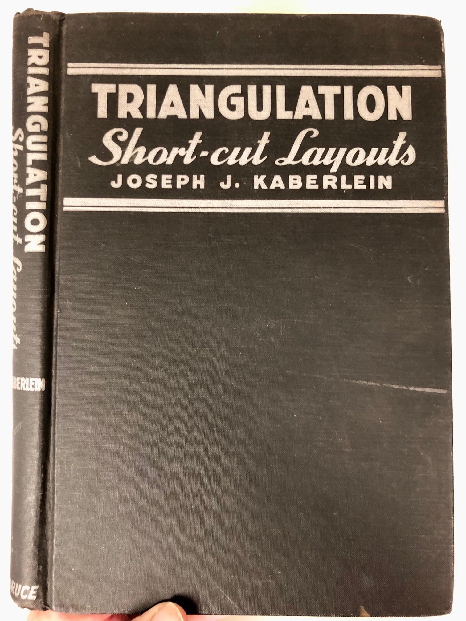 Triangulation short-cut layouts : a textbook and working guide with practical and modern methods for laying out and forming patterns used for blower-exhaust systems, heating and air conditioning. Mathematical formulas applied to sheet-metal work. [Hardcover] Joseph J Kaberlein by null