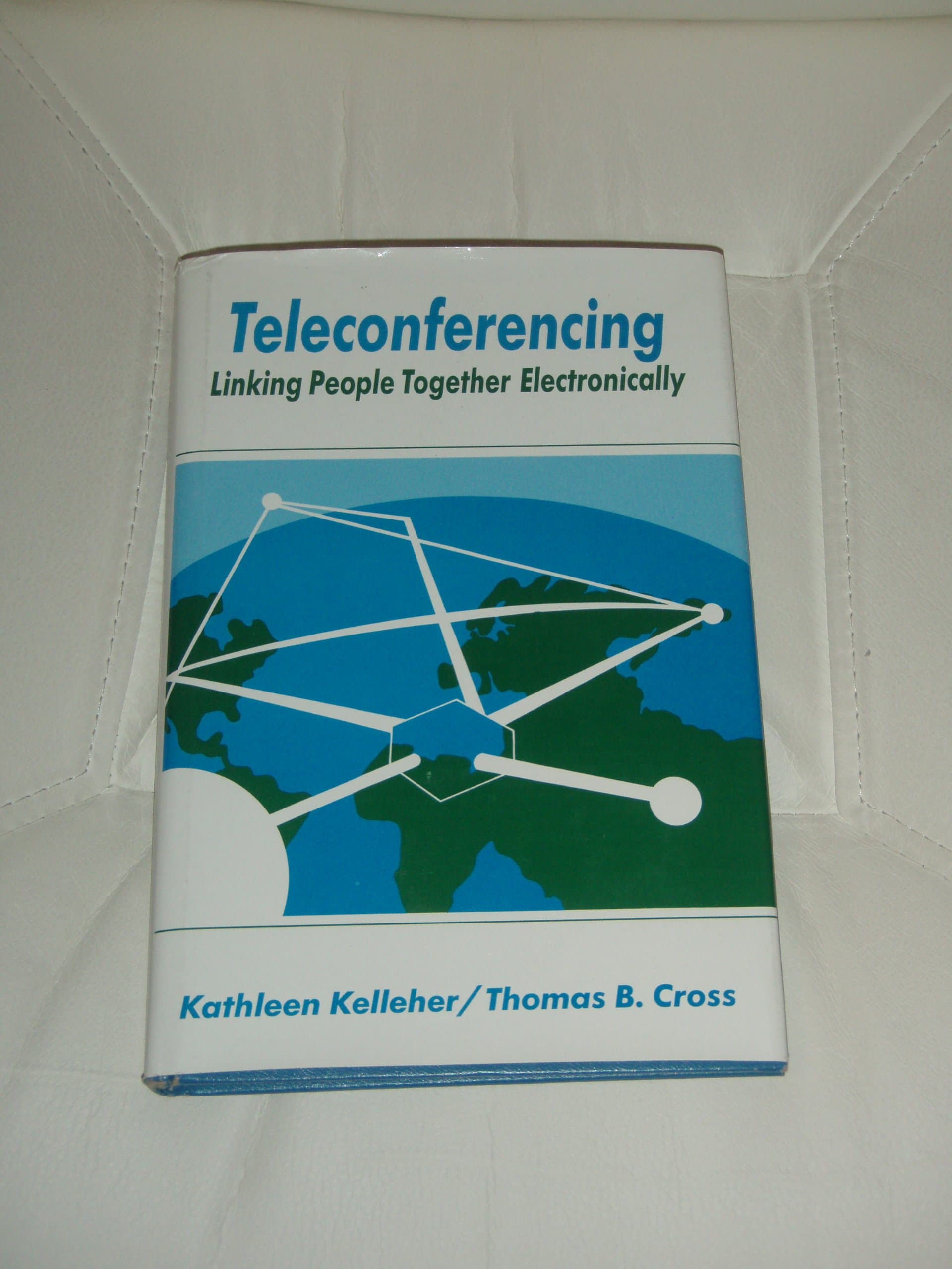 Teleconferencing: Linking people together electronically [Hardcover] Kathleen Kelleher and Thomas B. Cross by null