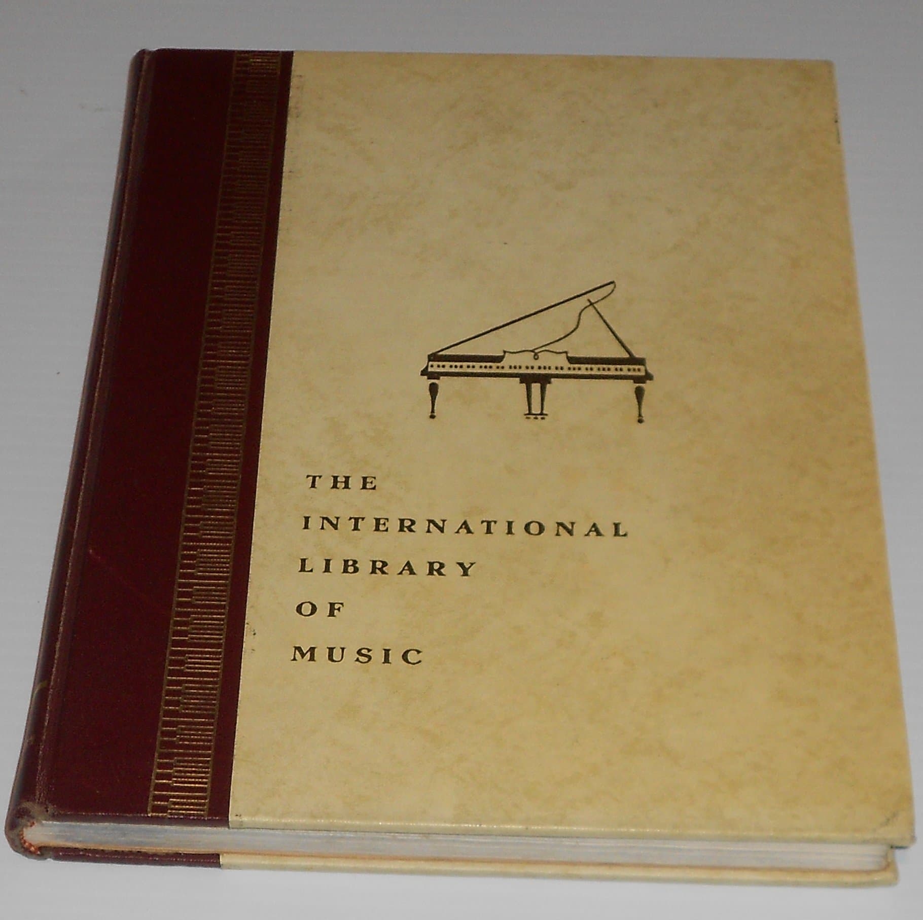 The International Library of Music: Album of the World's Best Home Songs [Hardcover] Arnold and Greissle Broido by null