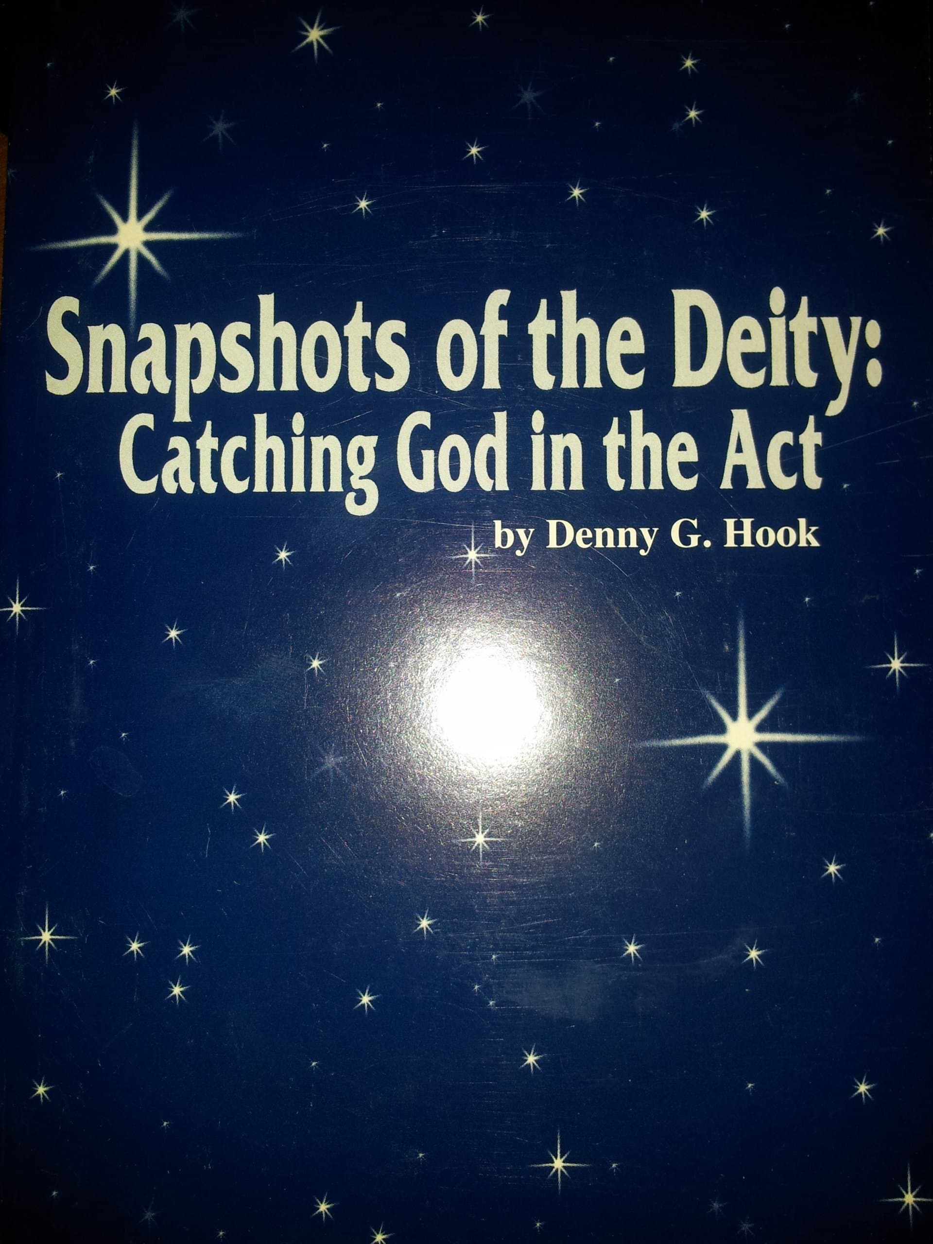 Snapshots of the Deity: Catching God in the Act [Paperback] Denny G. Hook by null