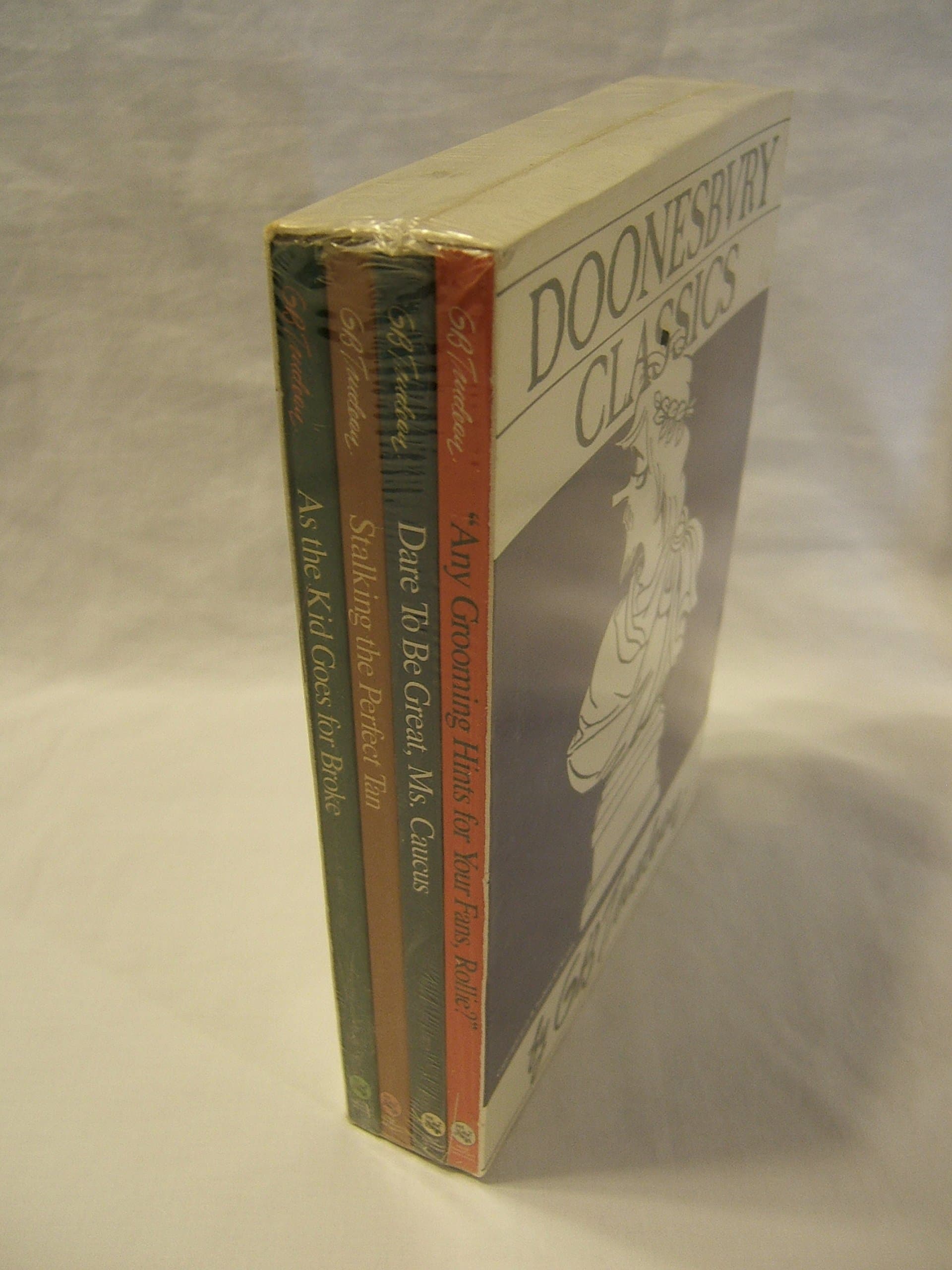 DOONESBURY CLASSICS (4 Volume Set) Dare to Be Great, Ms. Caucus ; As the Kid Goes for Broke; "Any Grooming Hints for Your Fans, Rollie?" ; Stalking the Perfect Tan [Paperback] G.B. Trudeau by null