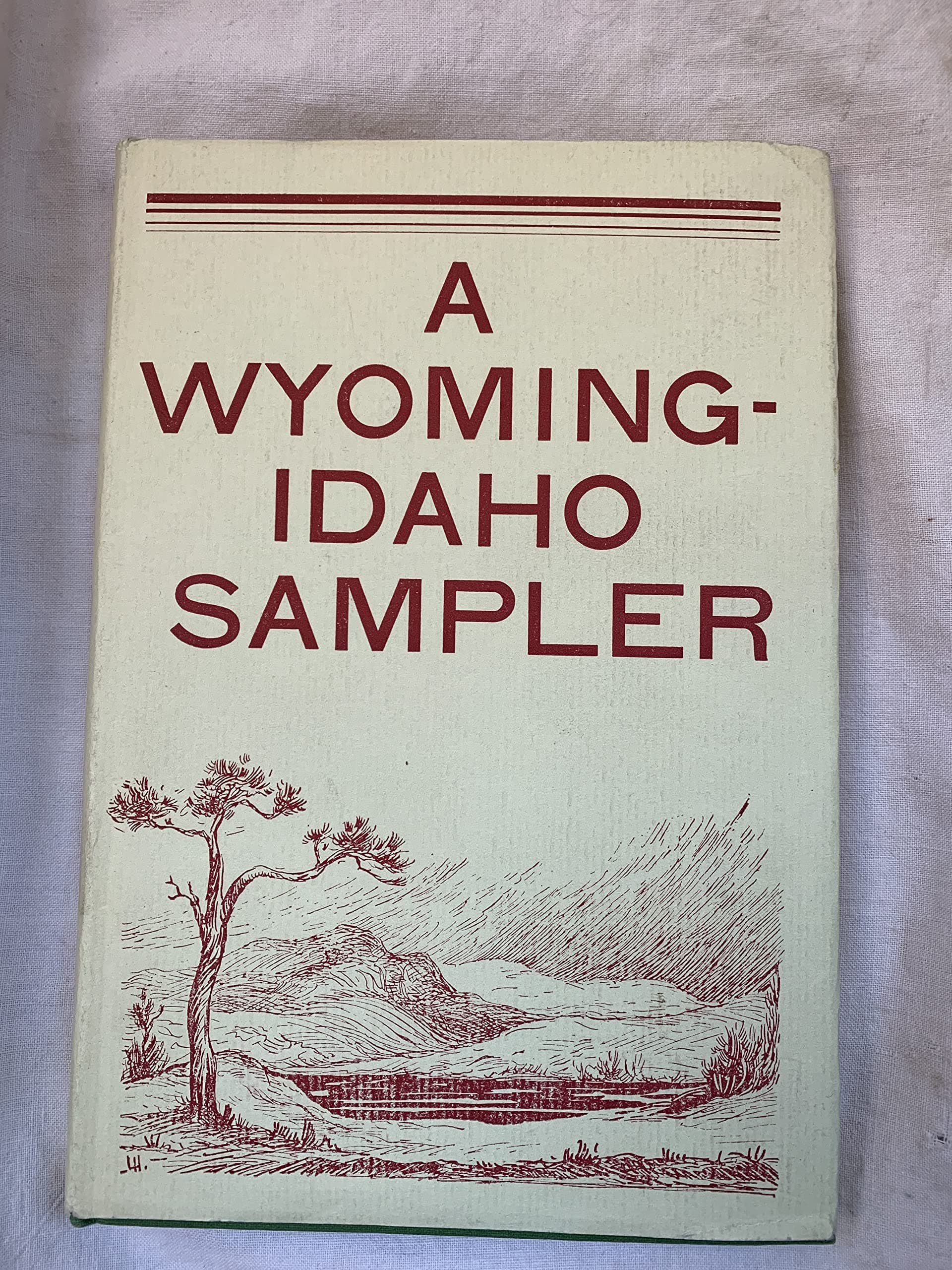 A WYOMING-IDAHO SAMPLER An Anthology Compiled in Honor of the Fiftieth Anniversary of Statehood [Hardcover] Various by null