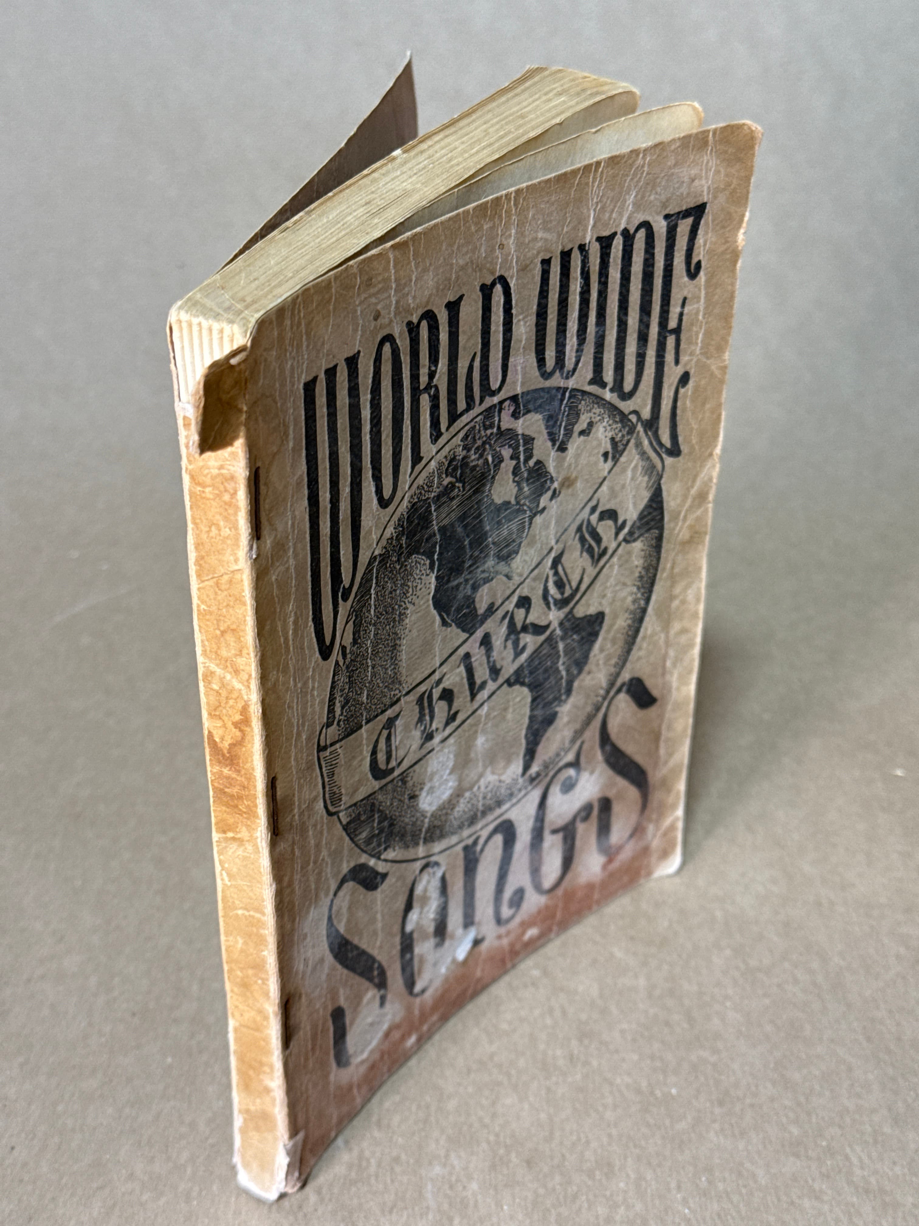 World Wide Church Songs by Compiled by The Stamps Quartets - quarter view showing binding condition