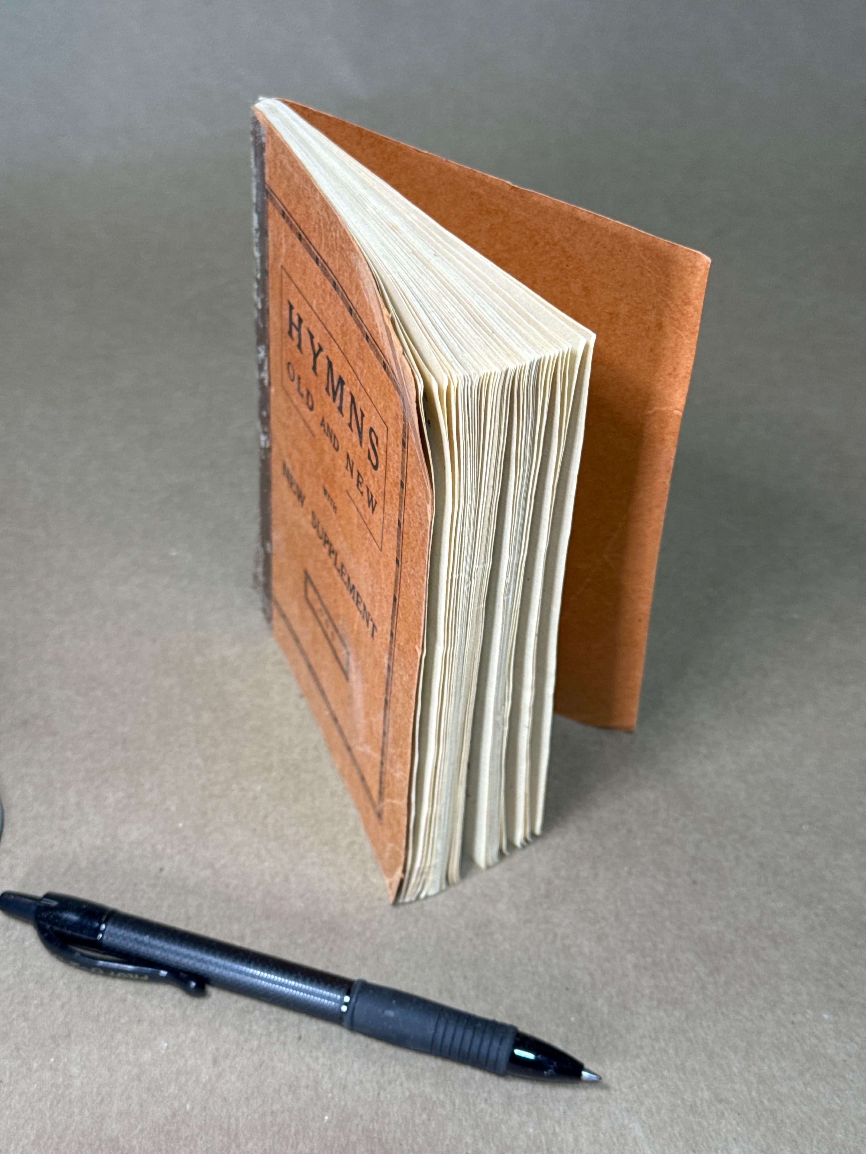 Hymns Old and New with New Supplement - quarter view showing binding condition