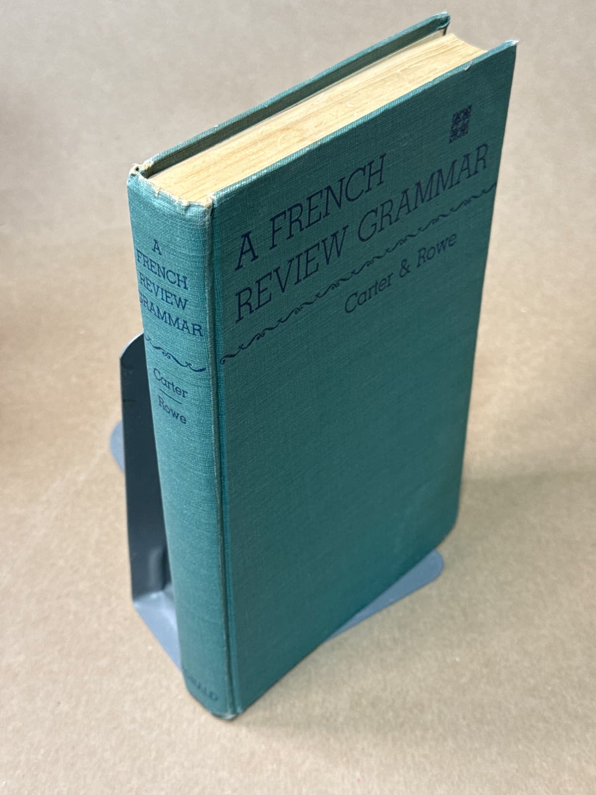 A French Review Grammar by Boyd G. Carter, Ph.D. and Charles G. Rowe, Ph.D. - quarter view showing binding condition
