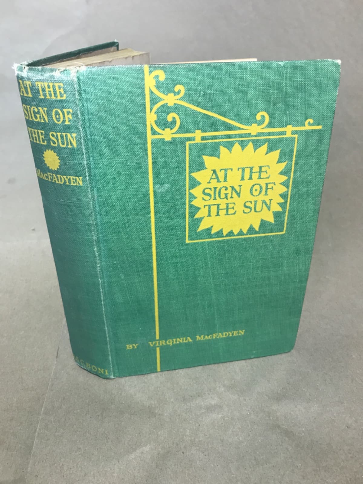 At the Sign of the Sun by Virginia MacFadyen - quarter view showing binding condition