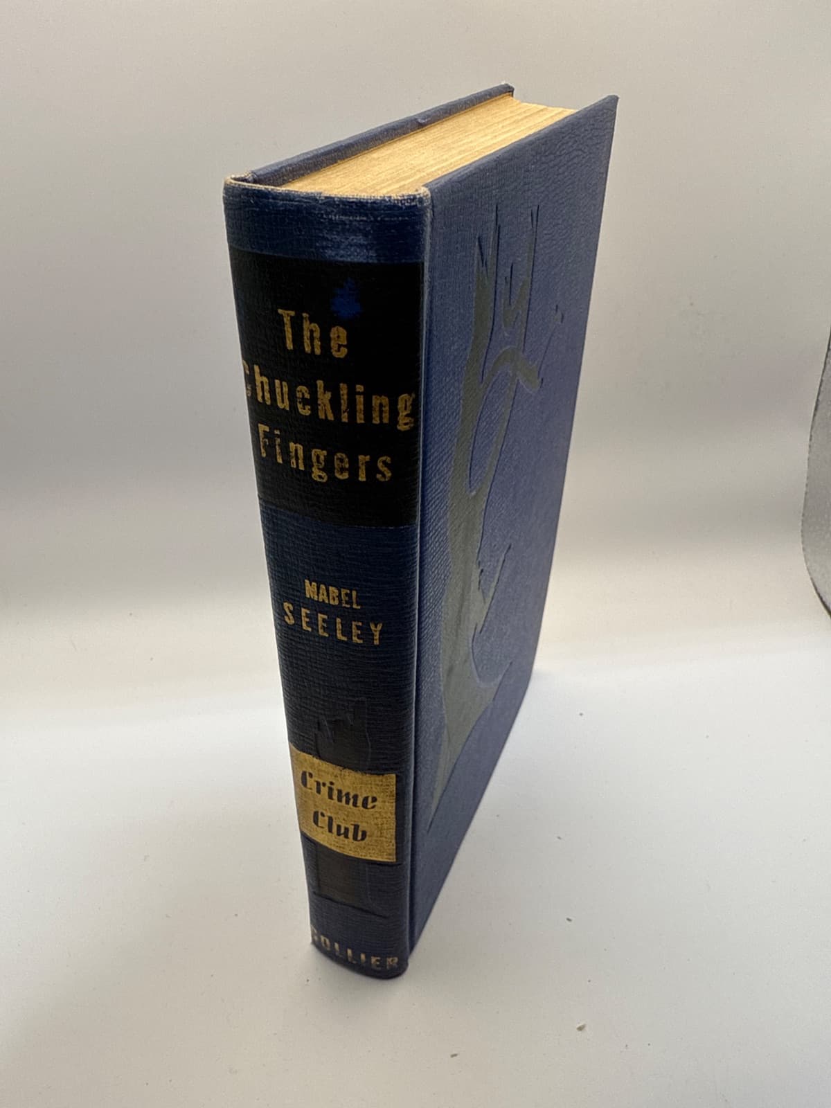 The Chuckling Fingers by Mabel Seeley - quarter view showing binding condition