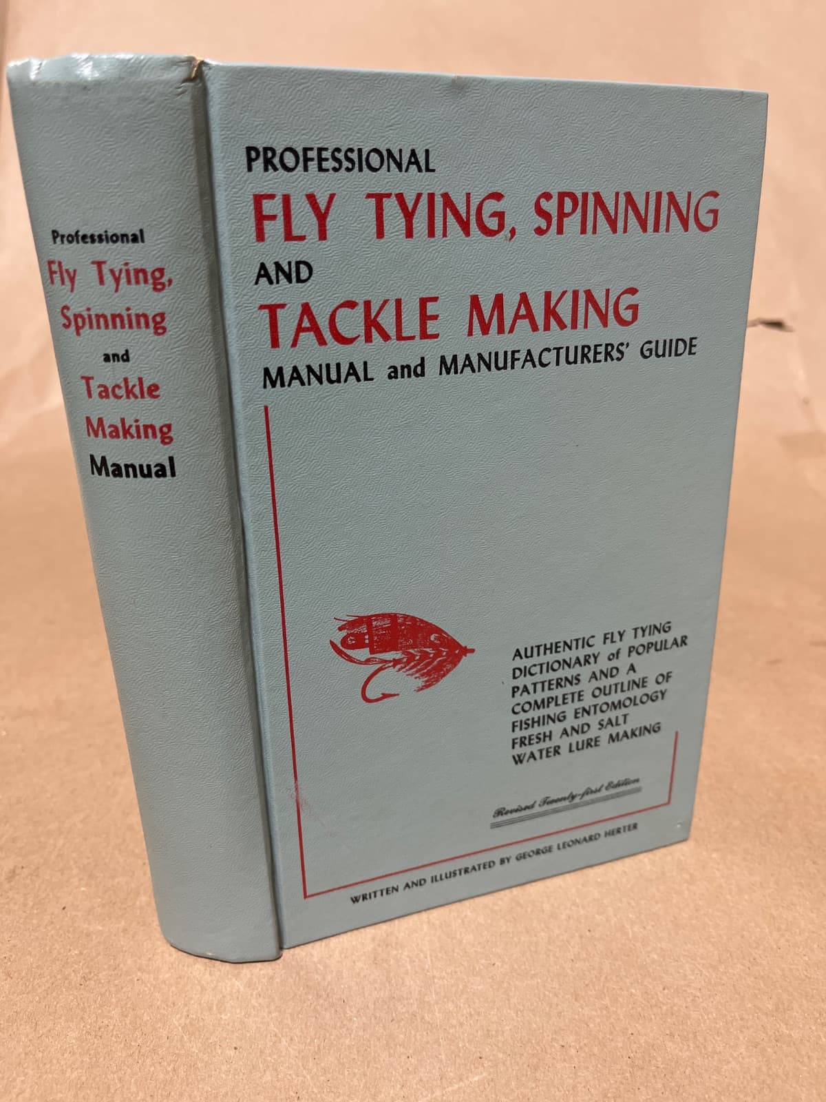 Professional Fly Tying, Spinning and Tackle Making Manual and Manufacturers' Guide by George Leonard Herter - quarter view showing binding condition