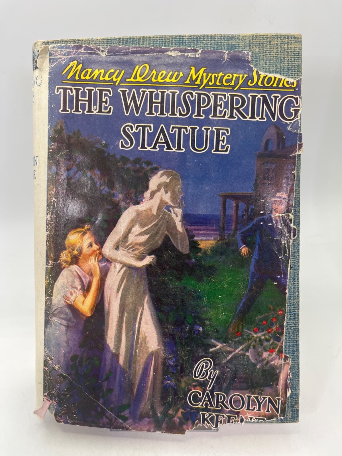 The Whispering Statue by Carolyn Keene - front cover