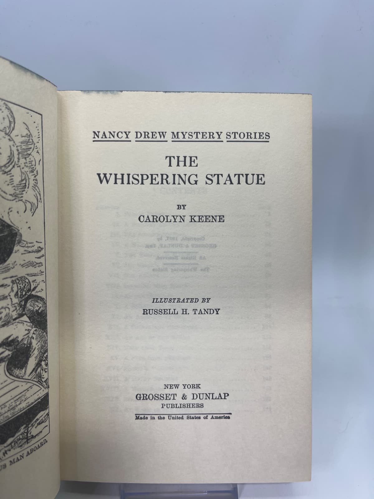 The Whispering Statue by Carolyn Keene - title page