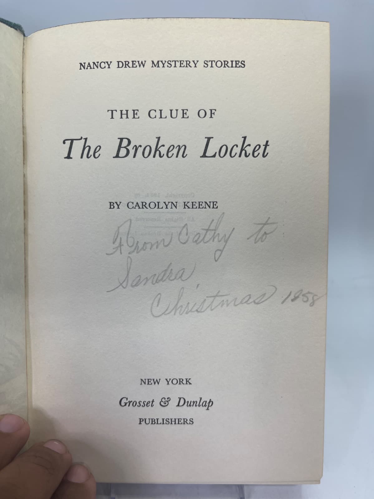 The Clue of the Broken Locket by Carolyn Keene - title page