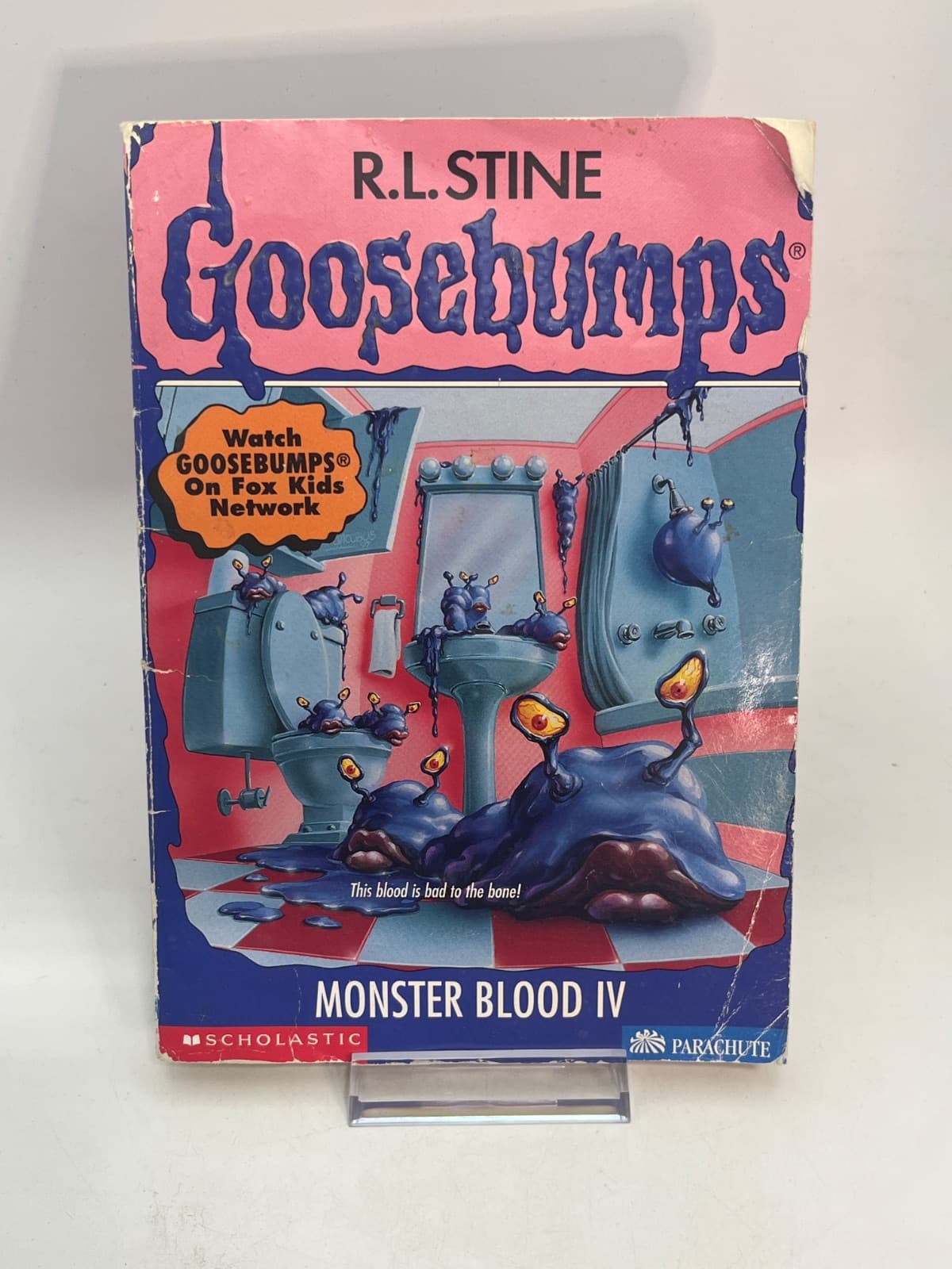 Monster Blood IV - NO CARDS - WATER DAMAGE  by R.L. Stine - front cover