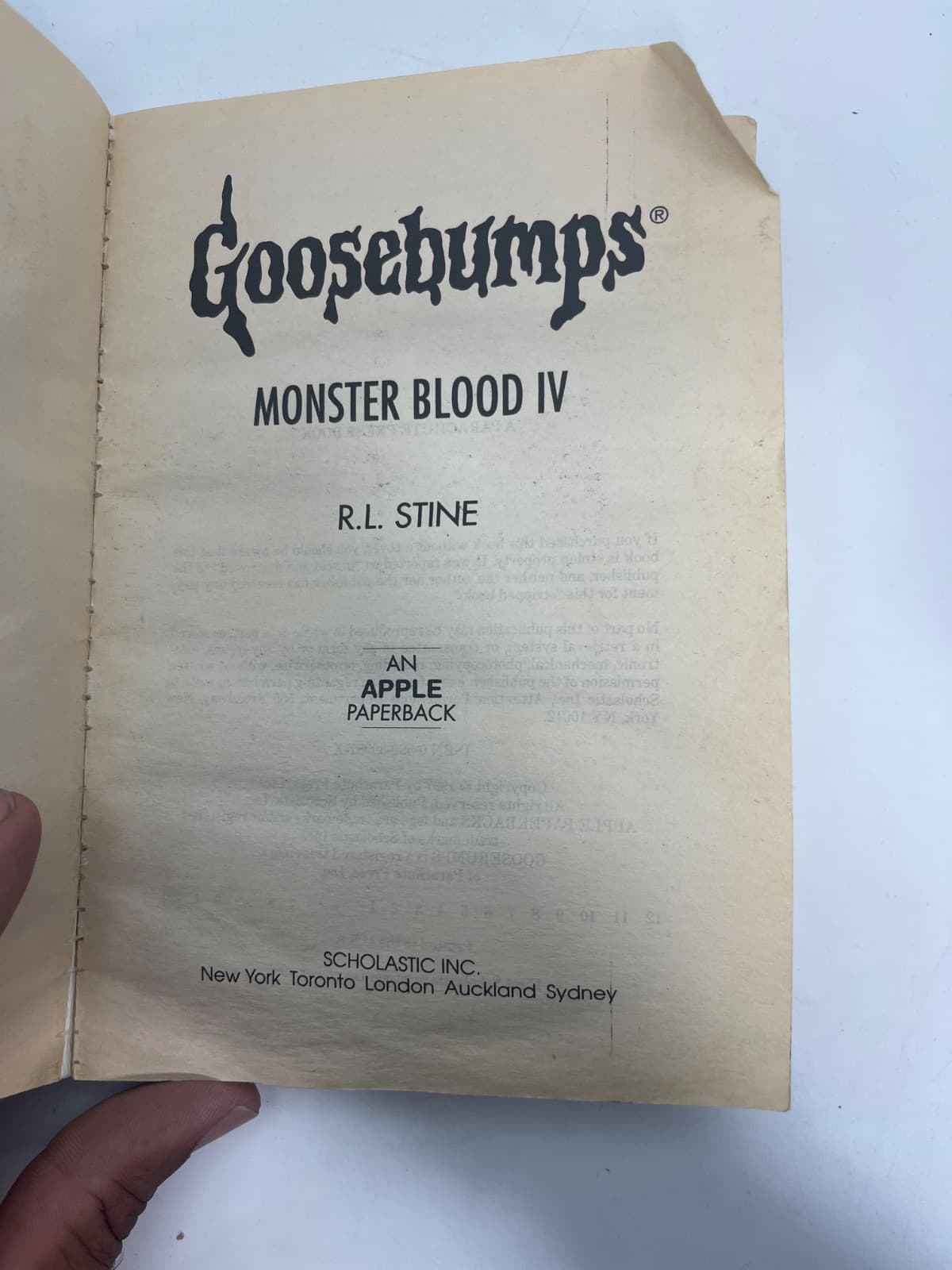 Monster Blood IV - NO CARDS - WATER DAMAGE  by R.L. Stine - title page
