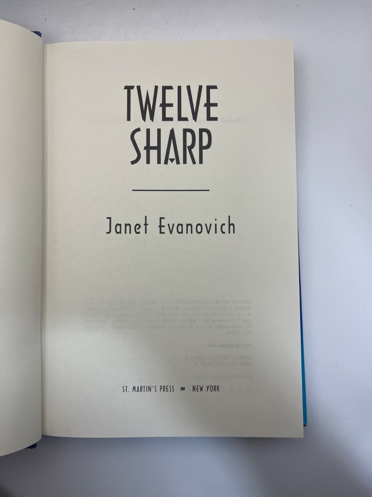 Twelve Sharp w Black Lettering  by Janet Evanovich - title page
