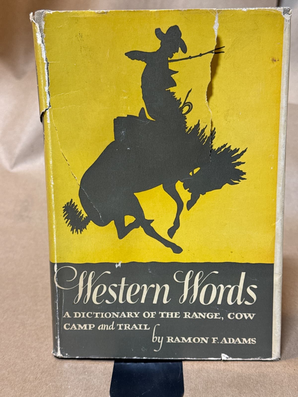 Western Words: A Dictionary of the Range, Cow Camp and Trail by Ramon F. Adams - front cover