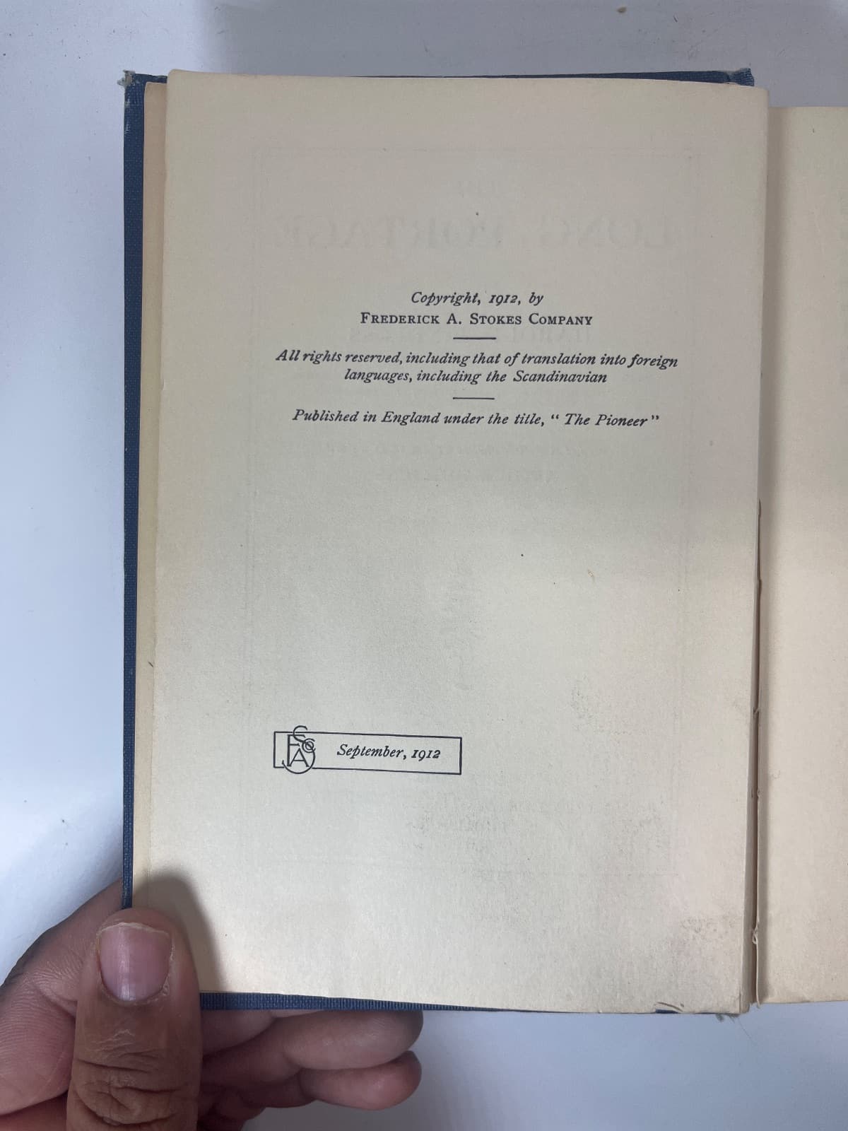The Long Portage by Harold Bindloss - copyright page showing 1912 details