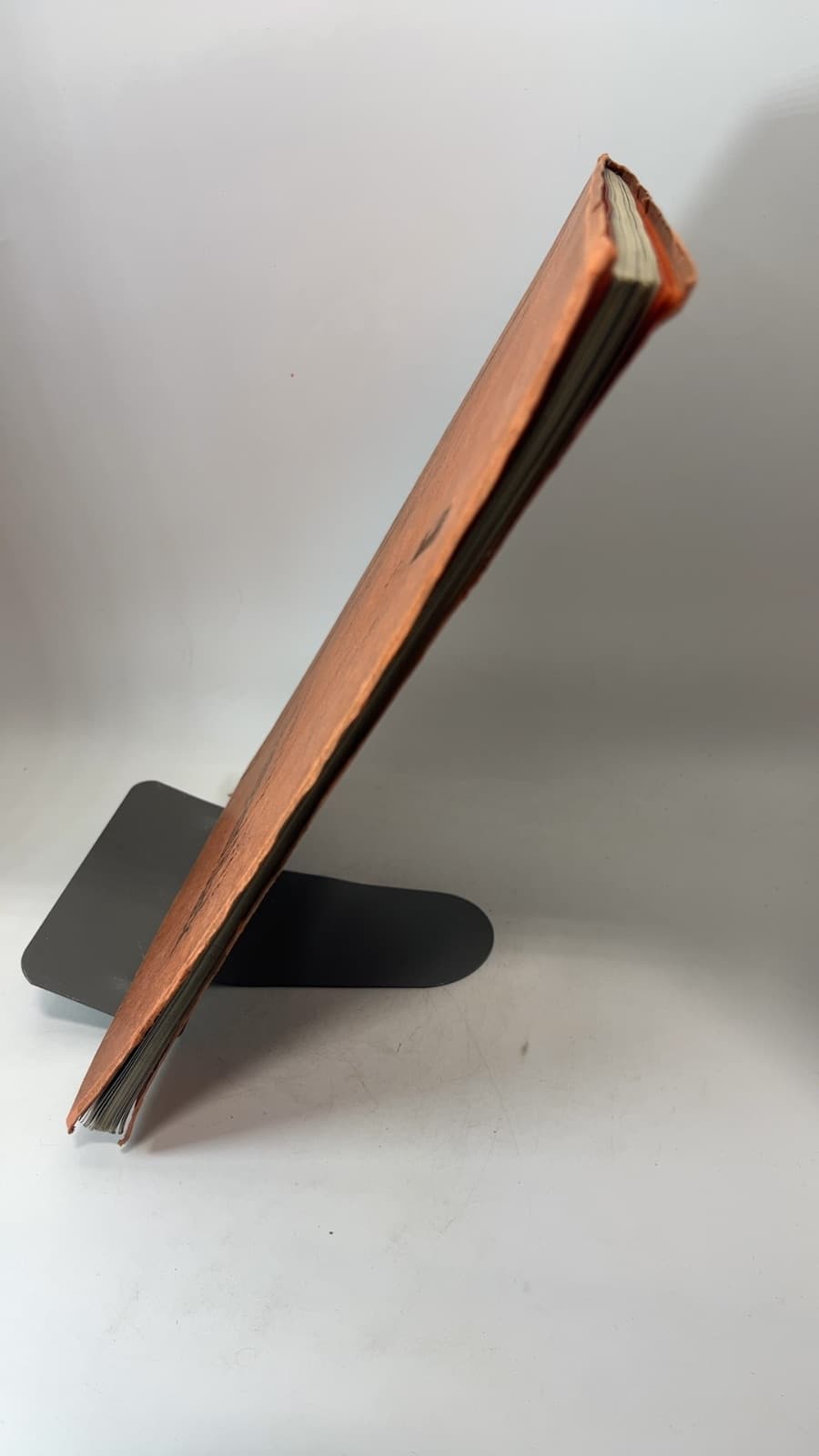 Orange and Black Woodrow Wilson High School Yearbook - quarter view showing binding condition