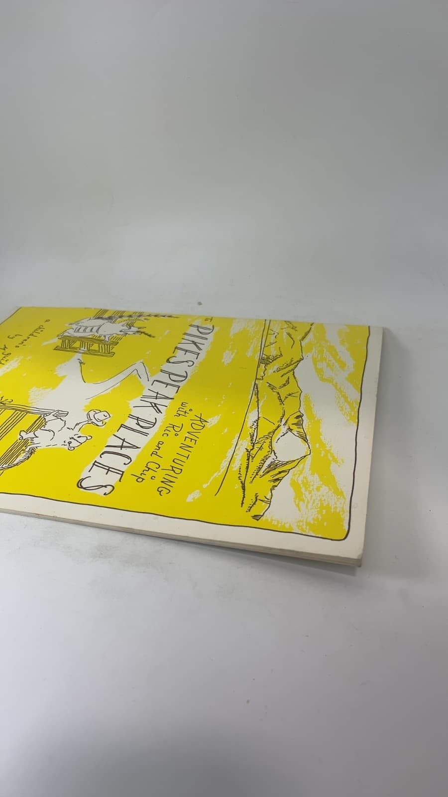 Adventuring with Ric and Chip to Pikes Peak Places by Mary Lou Anderson - quarter view showing binding condition