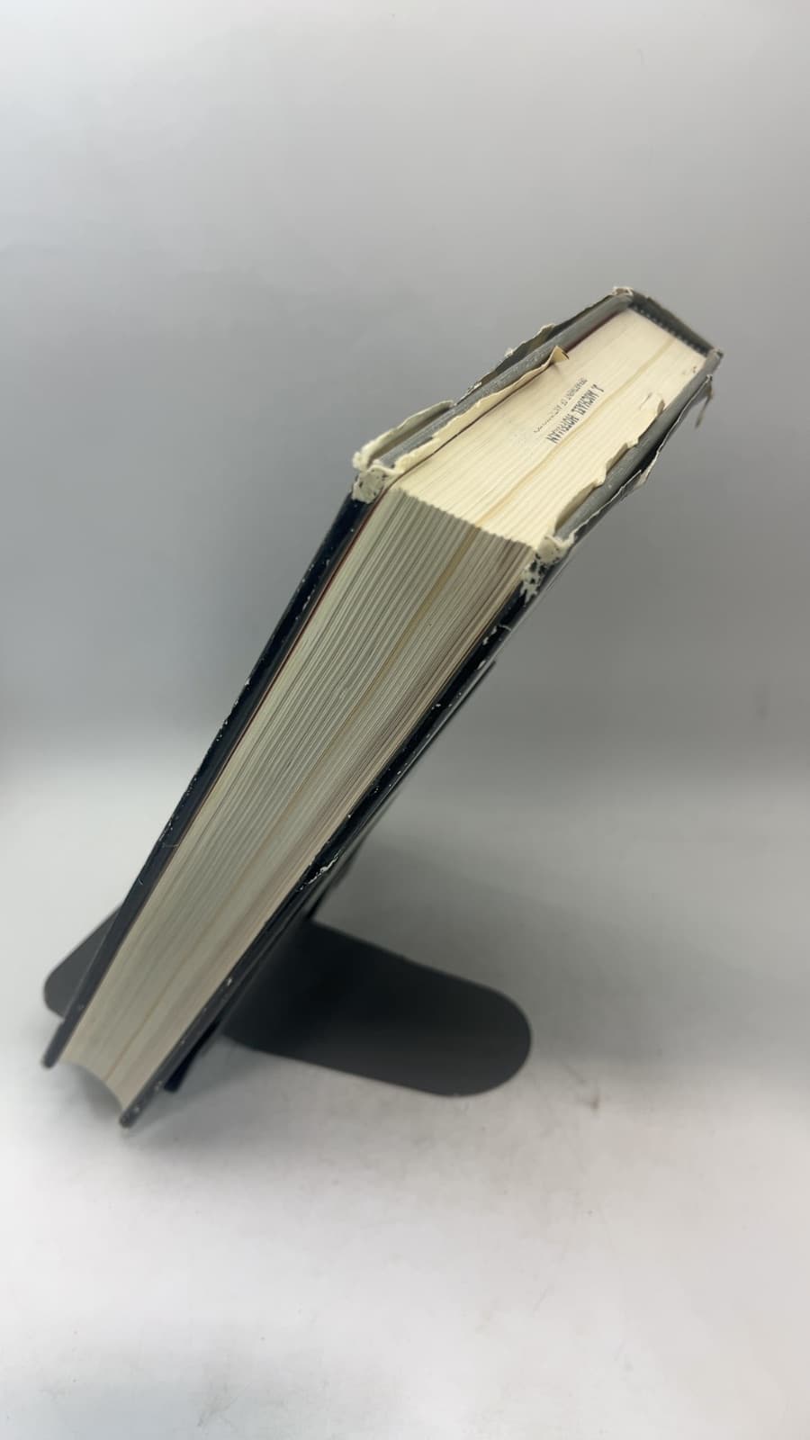 Race by John R. Baker - quarter view showing binding condition