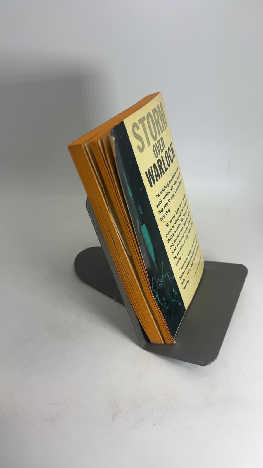 Storm Over Warlock by Andre Norton - quarter view showing binding condition