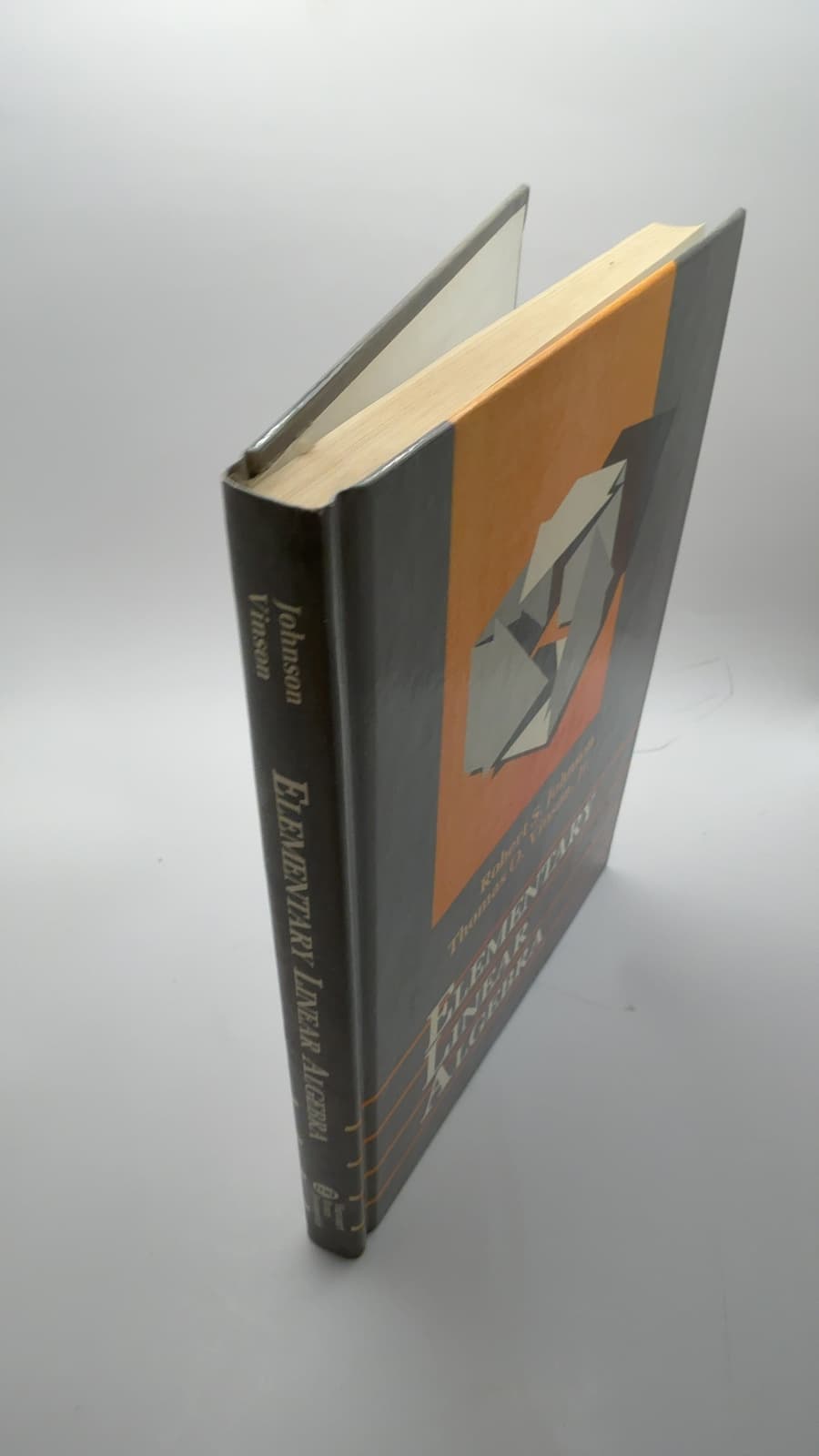 Elementary Linear Algebra by Robert S. Johnson and Thomas O. Vinson, Jr. - quarter view showing binding condition