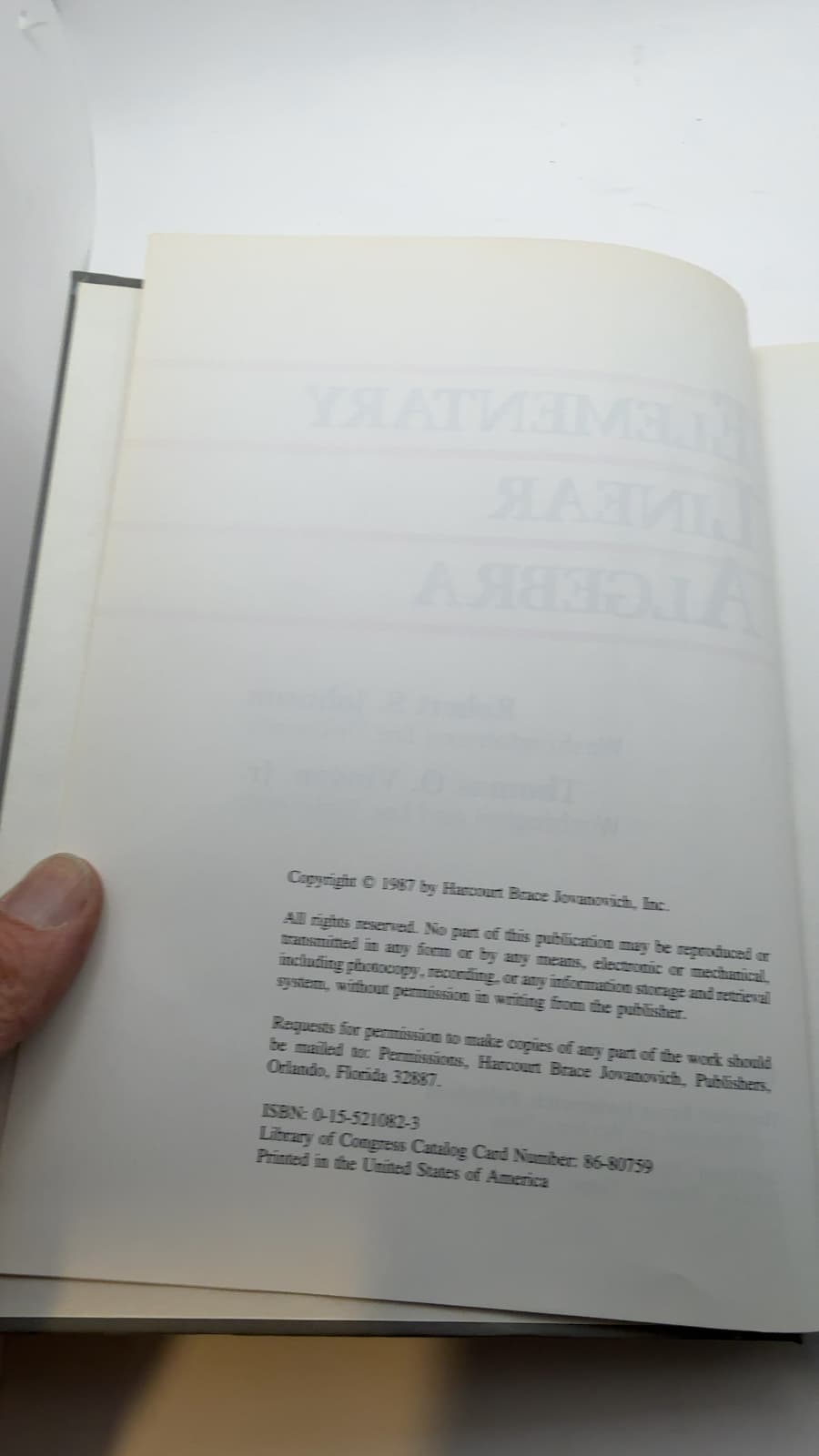 Elementary Linear Algebra by Robert S. Johnson and Thomas O. Vinson, Jr. - copyright page showing 1987 details