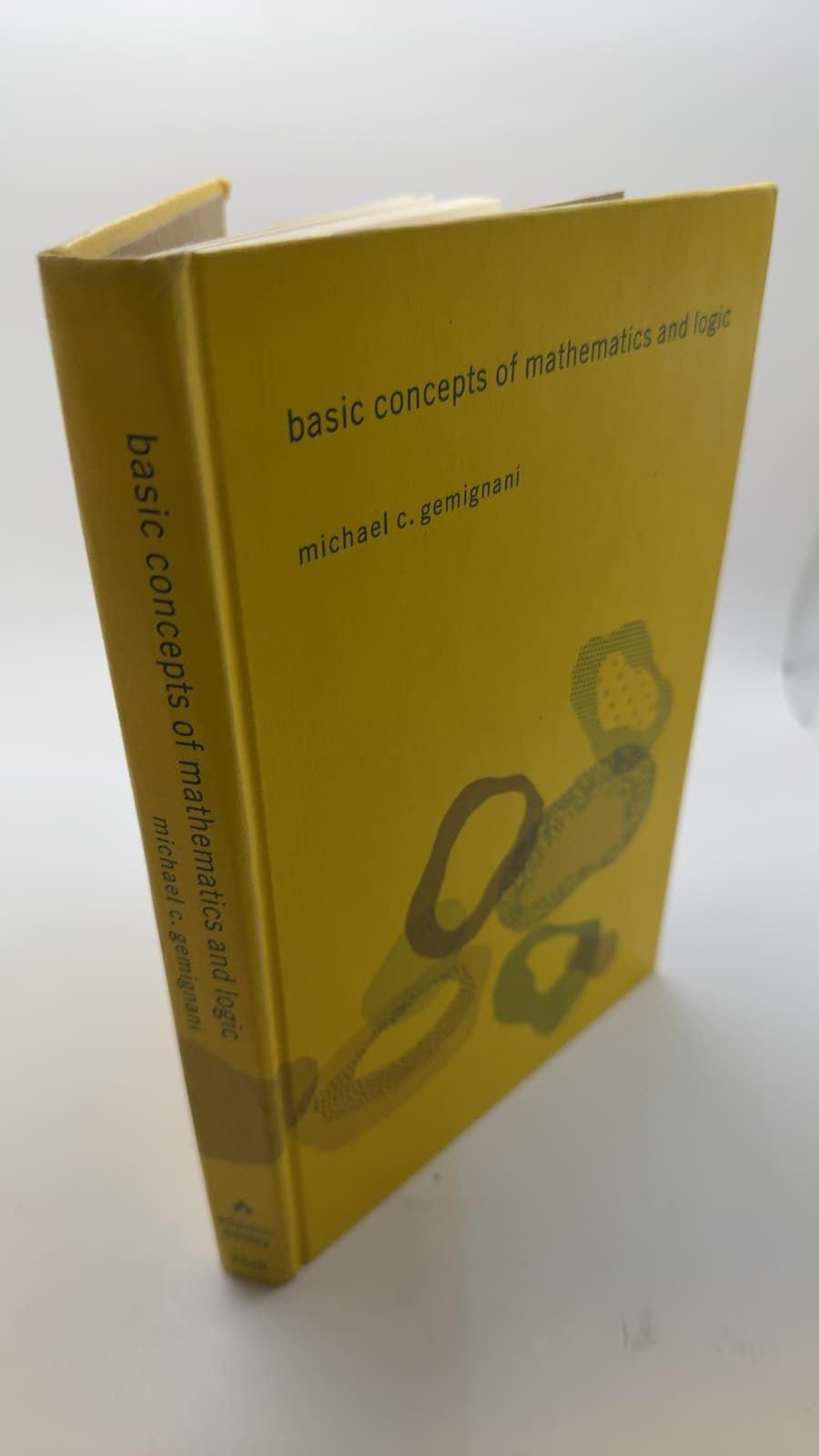Basic Concepts of Mathematics and Logic by Michael C. Gemignani - quarter view showing binding condition