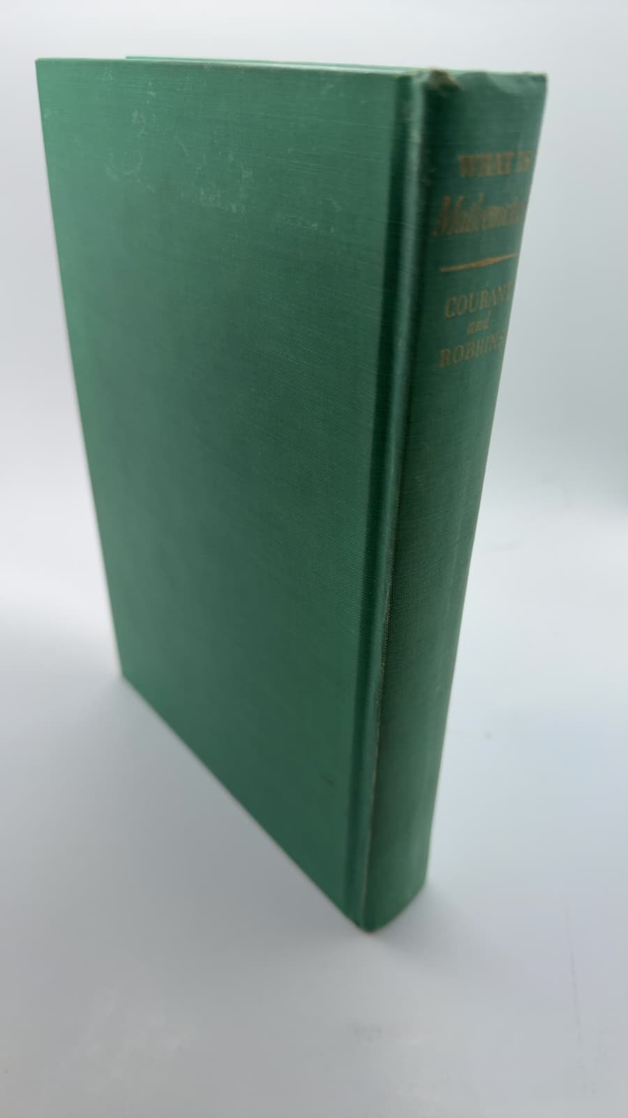 What Is Mathematics? An Elementary Approach to Ideas and Methods by Richard Courant and Herbert Robbins - quarter view showing binding condition