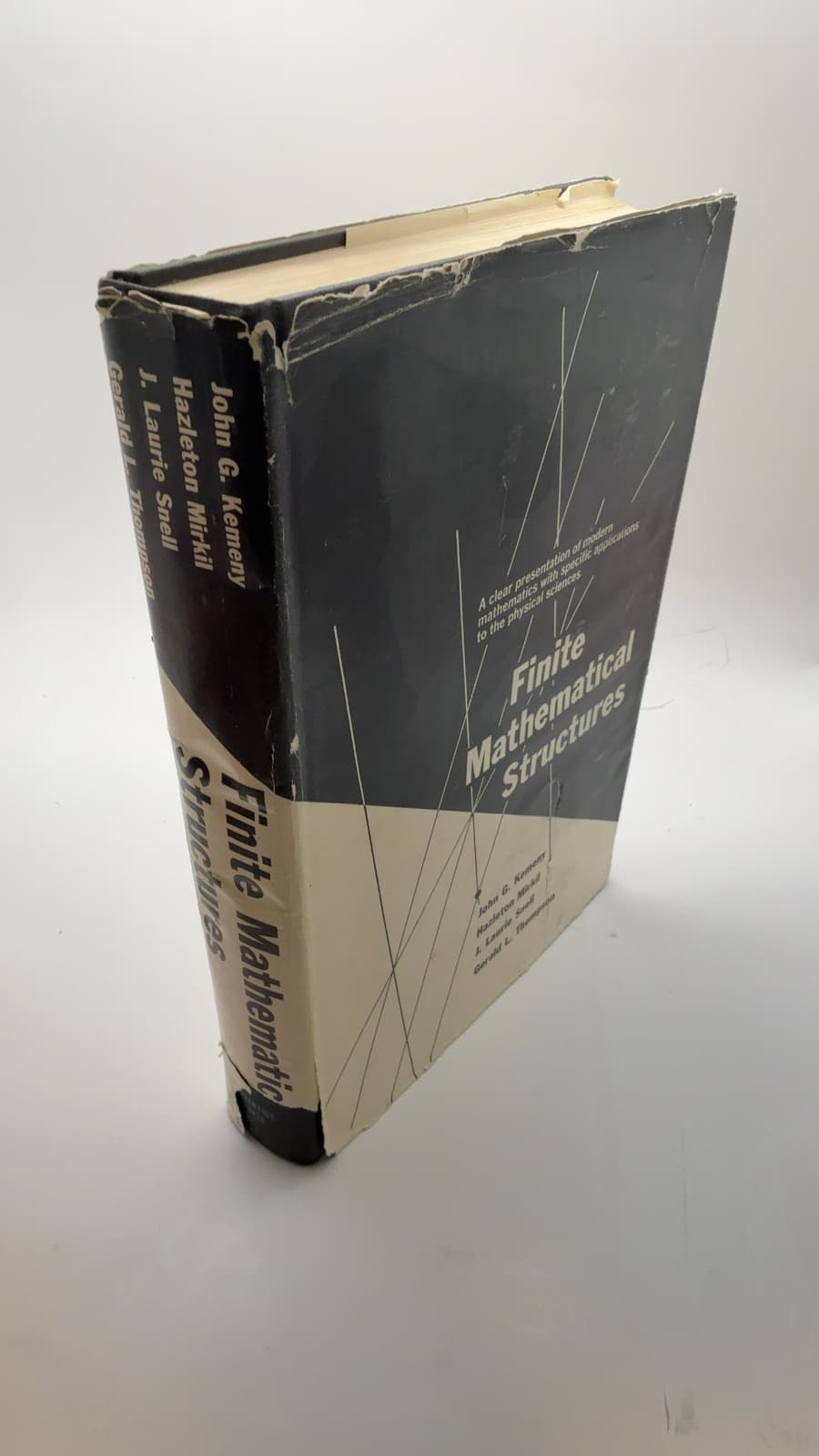 Finite Mathematical Structures by John G. Kemeny, Hazleton Mirkil, J. Laurie Snell, Gerald L. Thompson - quarter view showing binding condition