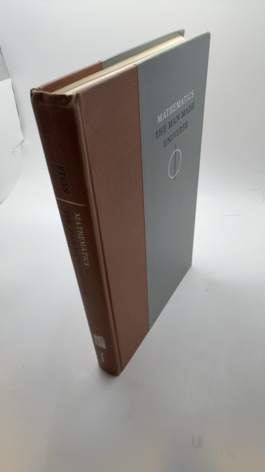 Mathematics: The Man-Made Universe by Sherman K. Stein - quarter view showing binding condition