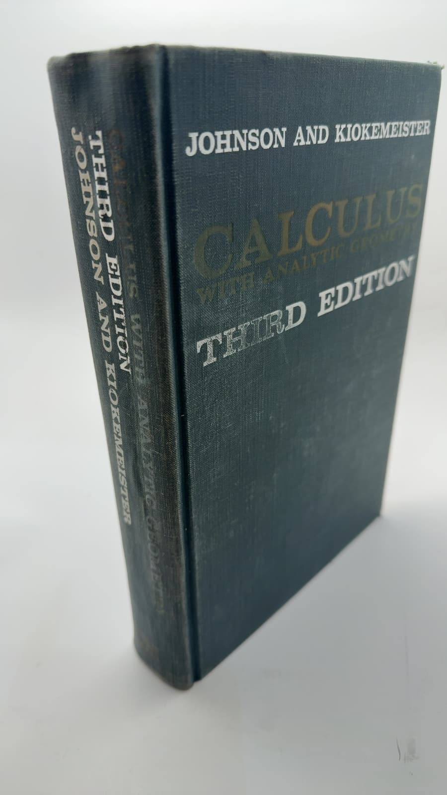 Calculus with Analytic Geometry by R. E. Johnson and F. L. Kiokemeister - quarter view showing binding condition