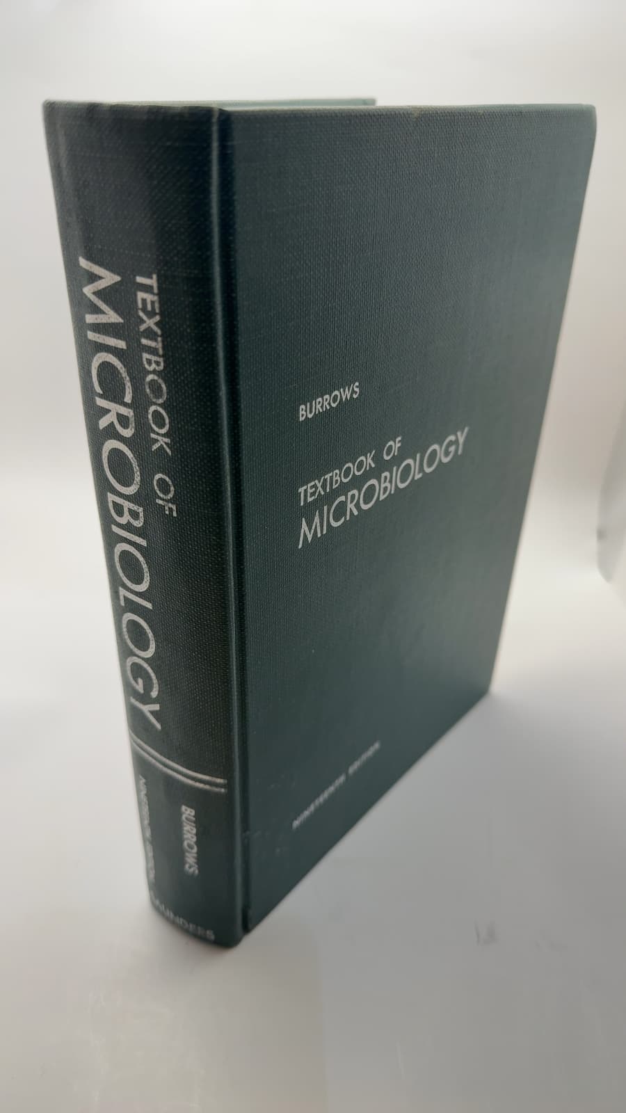 Textbook of Microbiology by William Burrows, Ph.D. - quarter view showing binding condition