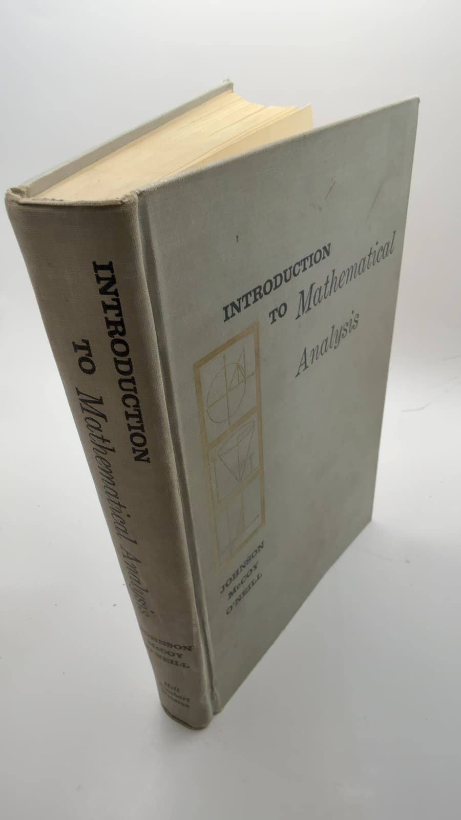 Introduction to Mathematical Analysis by Richard E. Johnson, Neal H. McCoy, Anne F. O'Neill - quarter view showing binding condition