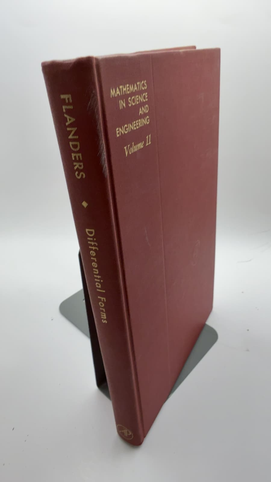 Differential Forms with Applications to the Physical Sciences by Harley Flanders - quarter view showing binding condition
