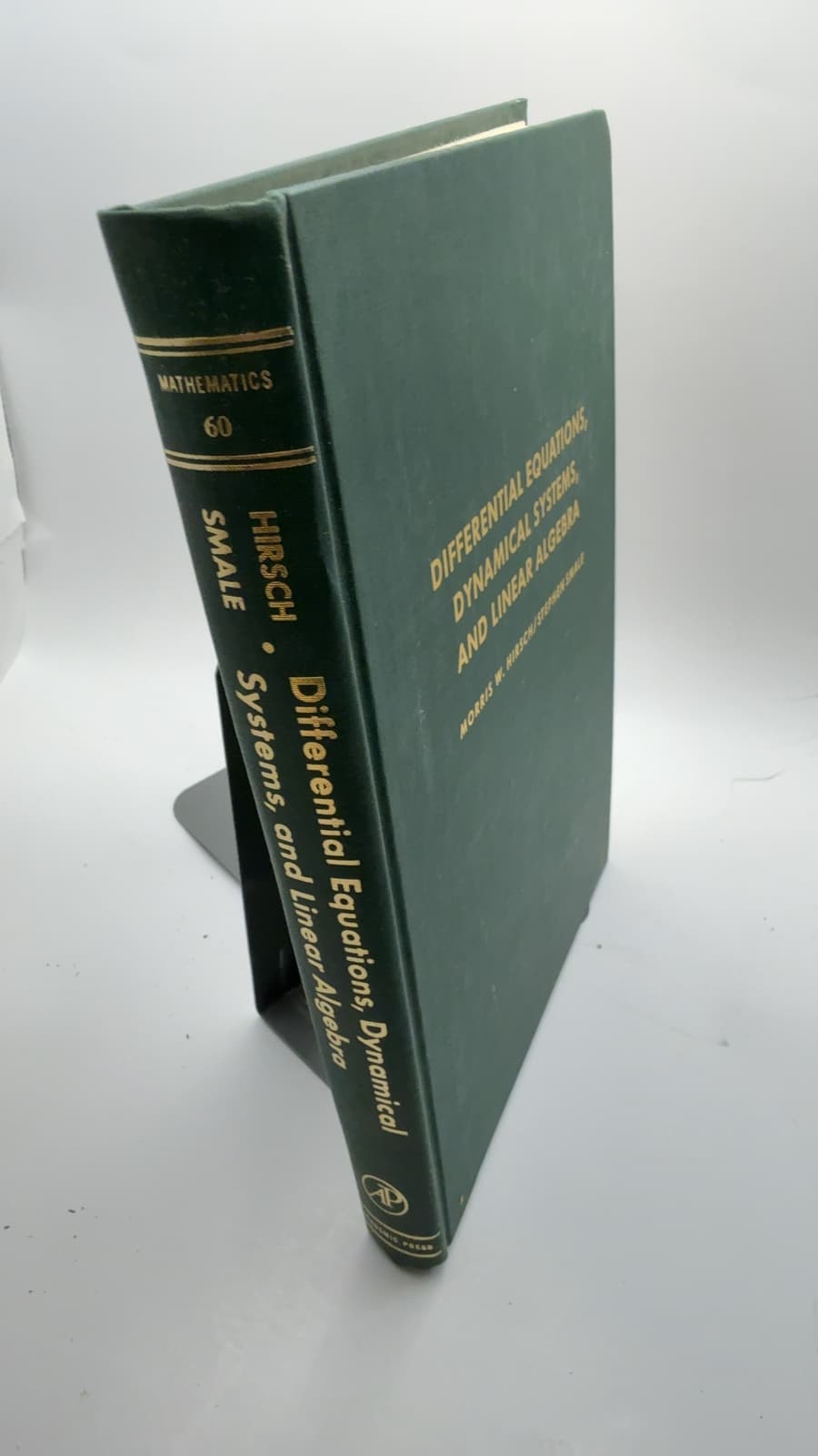 Differential Equations, Dynamical Systems, and Linear Algebra by Morris W. Hirsch and Stephen Smale - quarter view showing binding condition