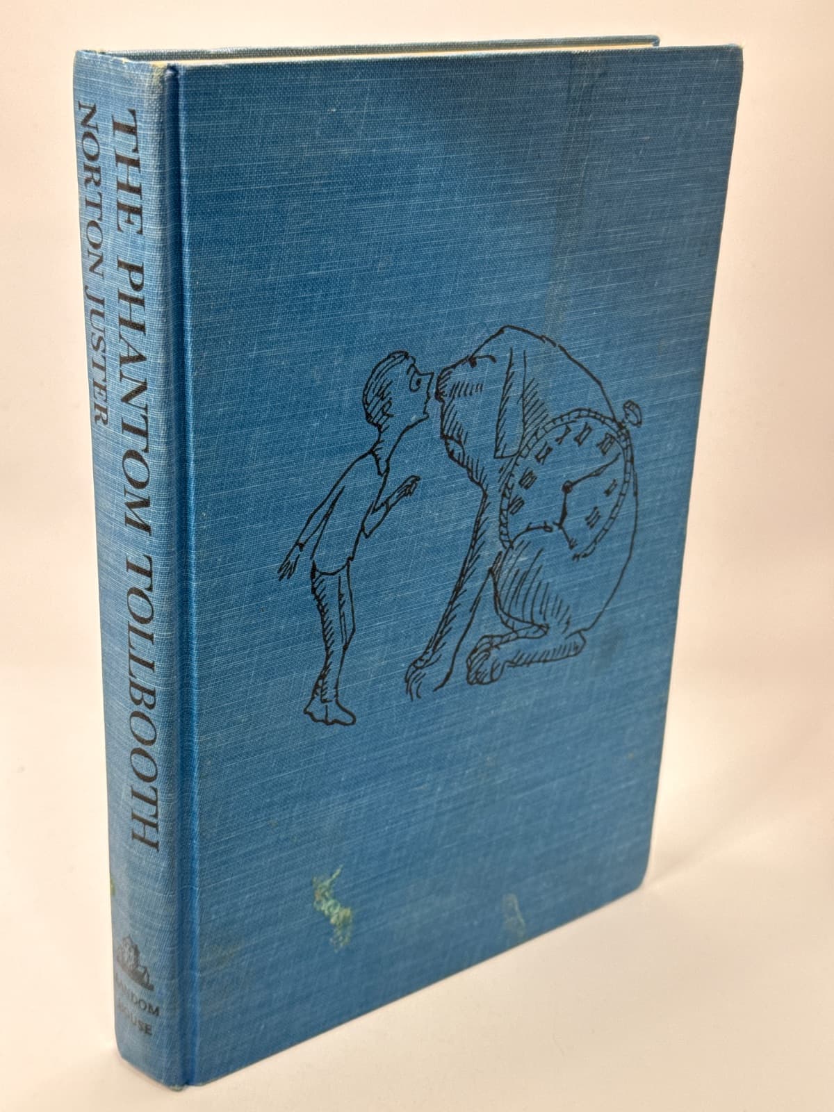 The Phantom Tollbooth by Norton Juster - quarter view showing binding condition