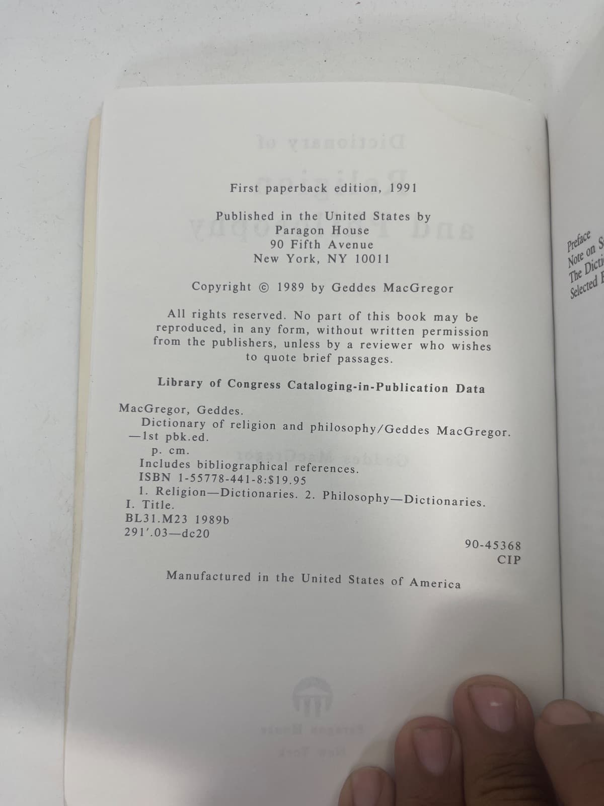Dictionary of Religion and Philosophy by Geddes MacGregor - copyright page showing 1991 details