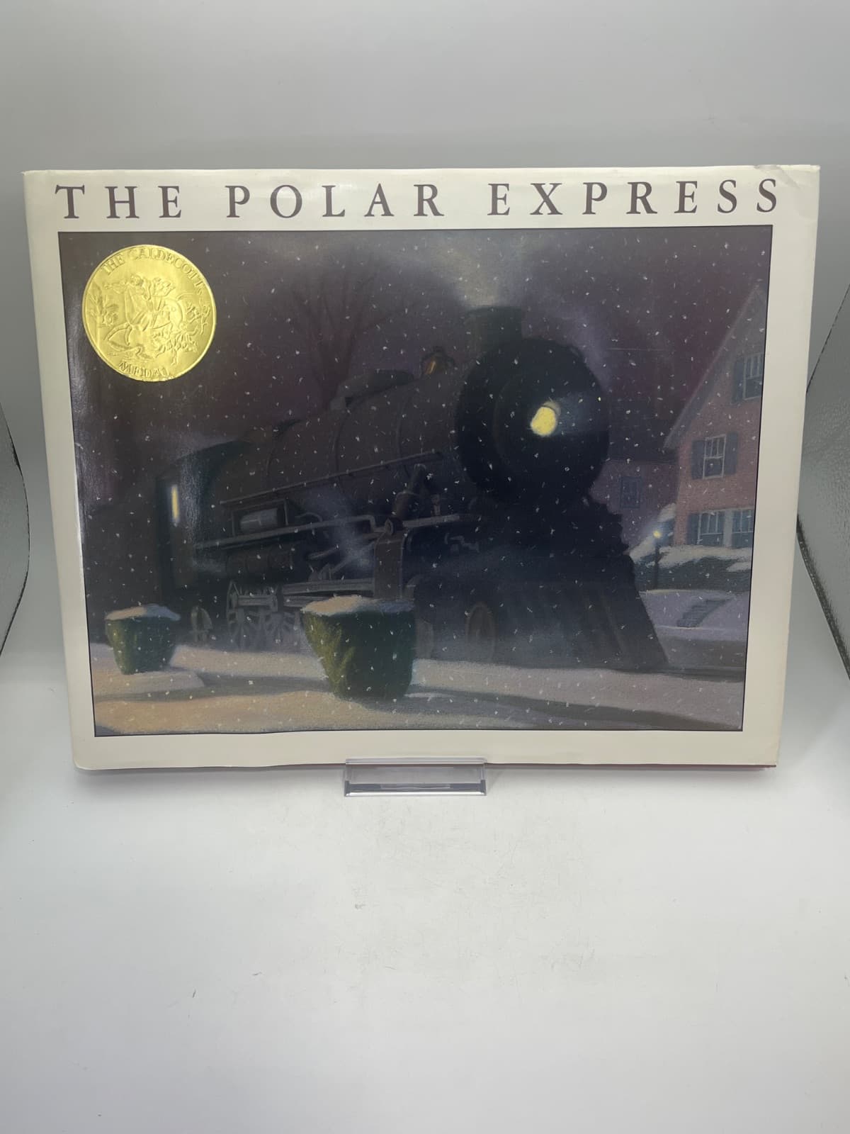The Polar Express w DJ - First Edition 5th Printing by Chris Van Allsburg - front cover